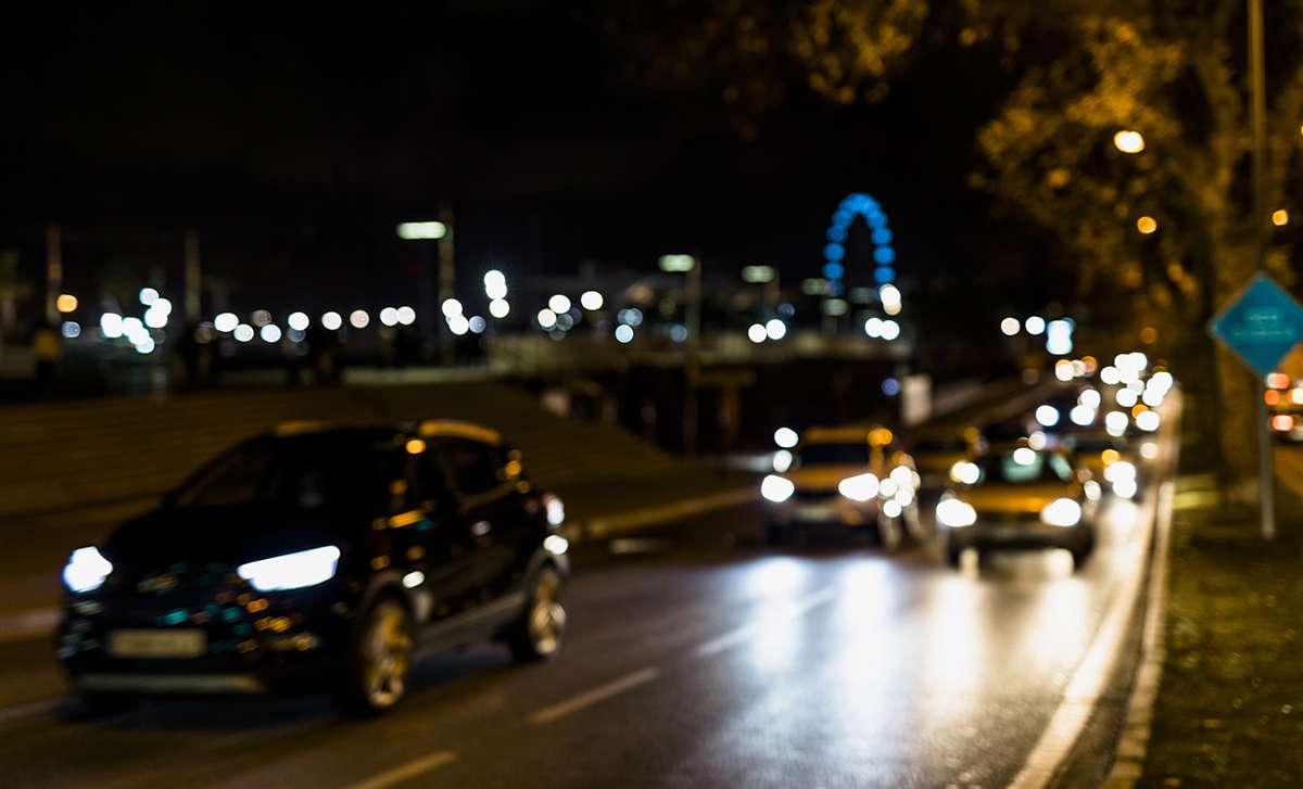 Image showcasing essential night driving safety tips, including reduced speed, proper lighting, and enhanced focus for navigating nighttime roads safely.