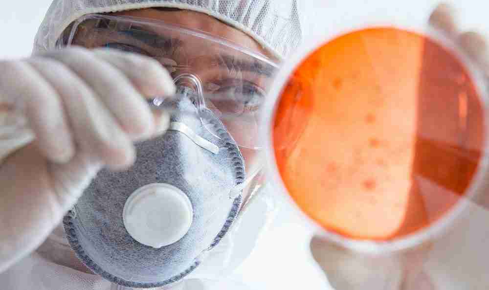 Researcher examining laboratory samples, reflecting the scientific and legal complexities surrounding Depo-Provera litigation.